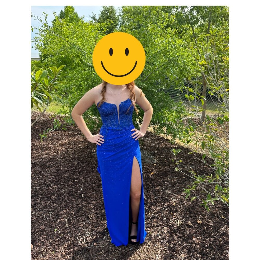 Electric blue sequined gown with train